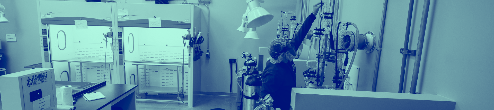 Blue washed image of Avanti Research staff in lab