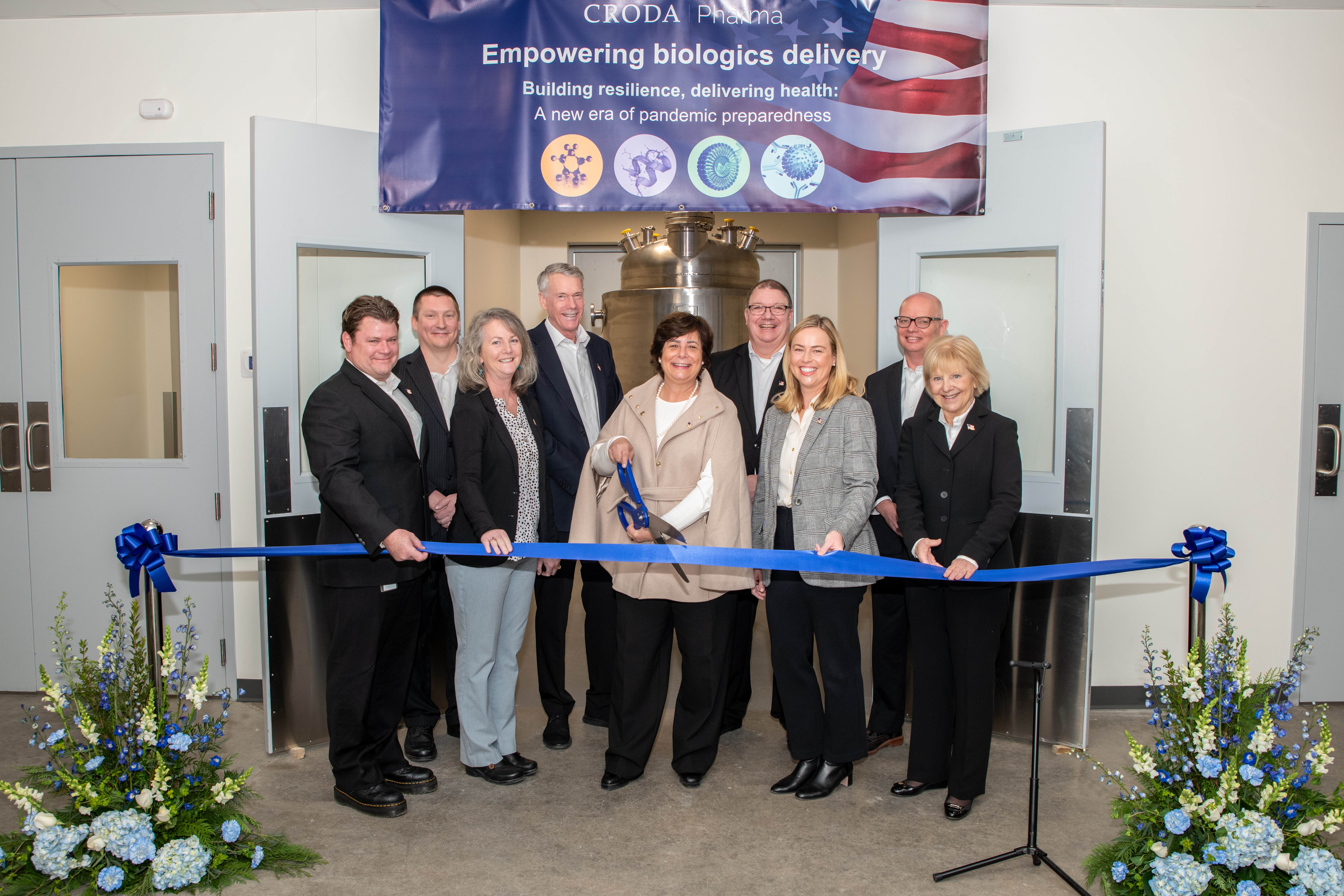 Members of Croda Pharma team cutting ribbon at LAMAR