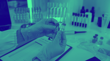 Green washed image of hands in lab