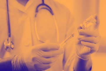 orange washed image of needle pulling injection from a vial