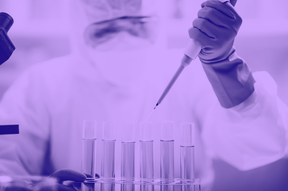 Purple washed image of scientist in lab