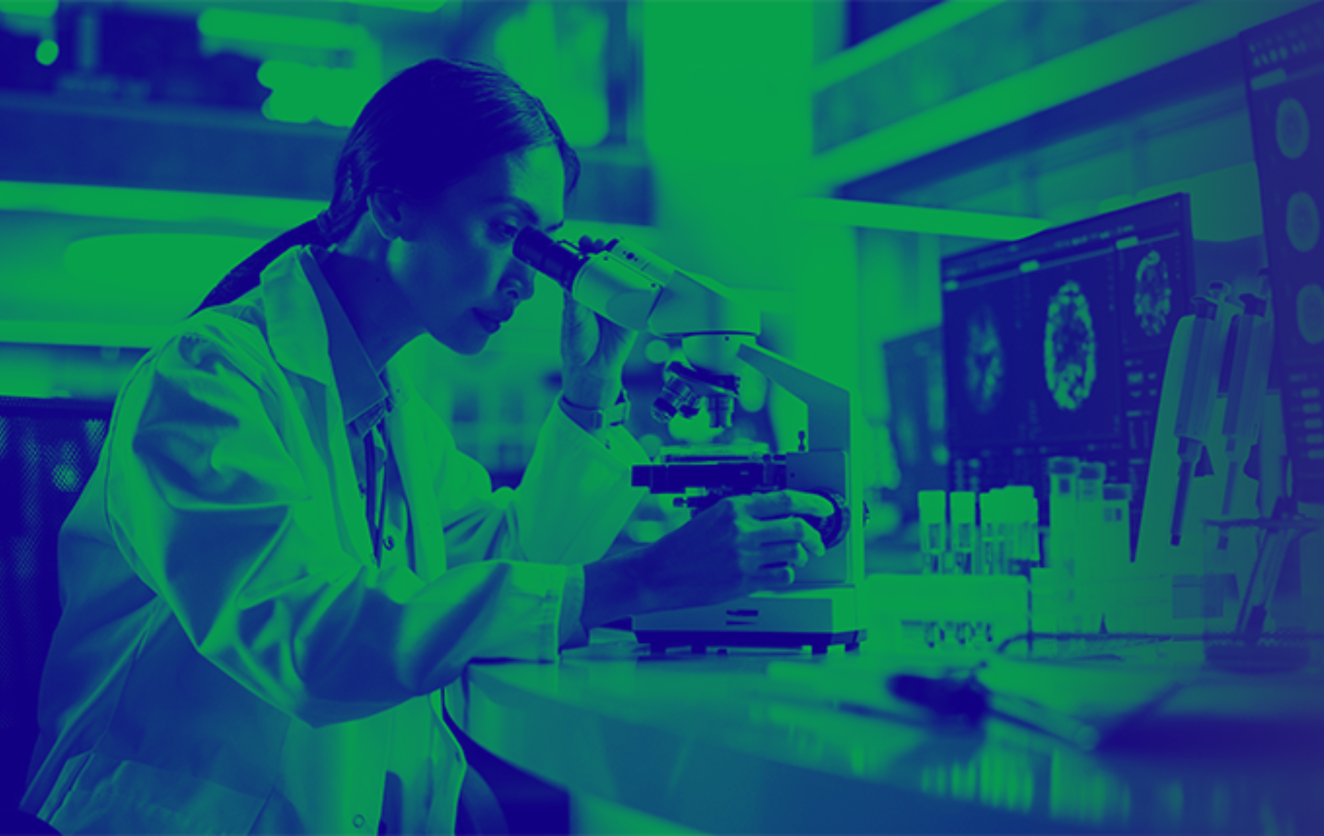 green washed image of researcher in lab