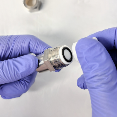    Carefully place the second internal membrane support into the casing (O-ring facing down) being careful not to twist the membrane support when it comes in contact with the membrane.